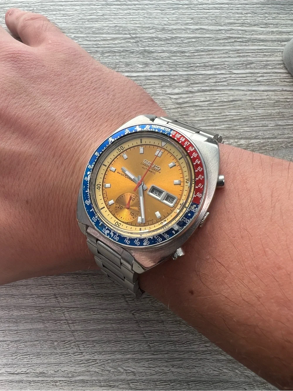 Seiko Pogue Yellow Dial Chronograph Watch with Blue and Red Tachymeter Bezel
